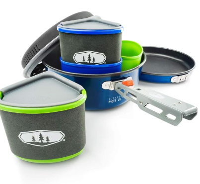 This affordable camping cookware set features a non‑stick pot, fry pan, strainer lid, mugs, bowls, and a sink sack