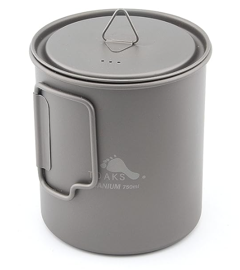 Image of TOAKS Titanium 750ml pot, a compact camping cookware for solo use with foldable handles and lid